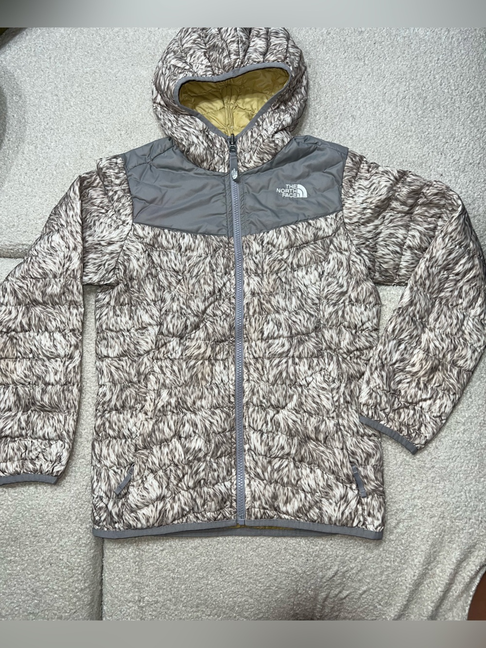 The North Face Reversible quilted jacket for kids.